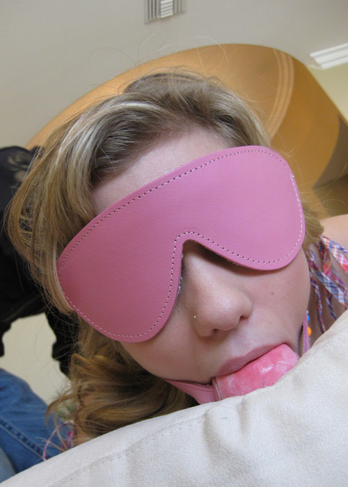 Nicole Ray blindfolded with ball gagged